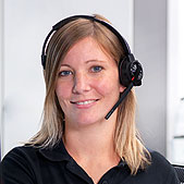 Junge weibliche ATLAS-Mitarbeiterin mit Headset